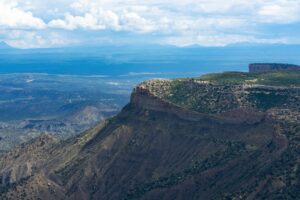 pexels-photo-18426306-18426306 Explore the stunning aerial view of the majestic Mesa Verde cliffs in Colorado, showcasing nature's beauty.