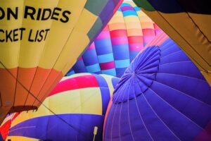 pexels-photo-3091117-3091117 Vibrant hot air balloons inflating at a balloon fiesta in New Mexico.